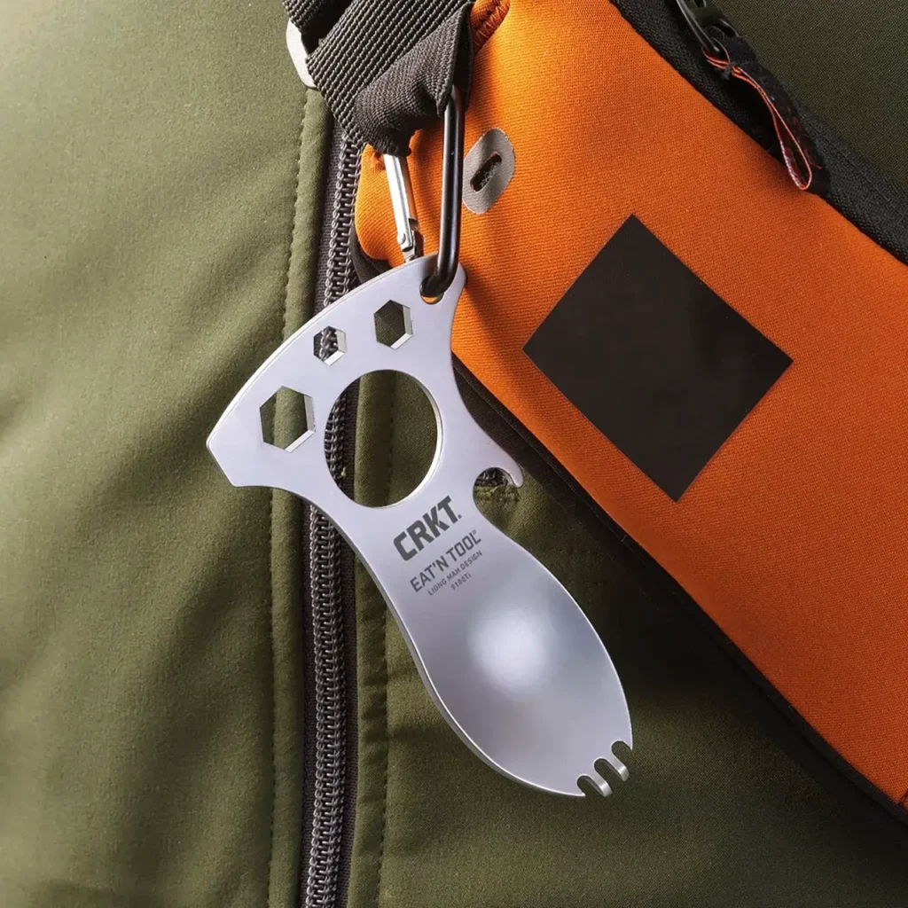 CRKT Eat’N Tool Spork clipped to a backpack for camping, hiking, and everyday outdoor carry