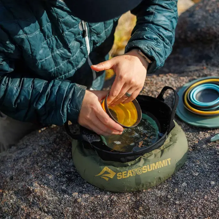 Sea to Summit Kitchen Sink for water and cleanup zone